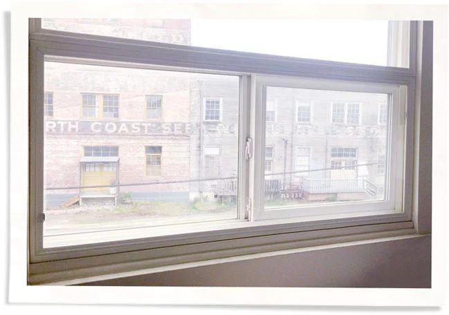 Indow window insert storm window mullion.