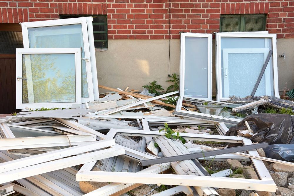 Windows torn out for replacement. Consider ecological impact with retrofit vs. replacement windows.