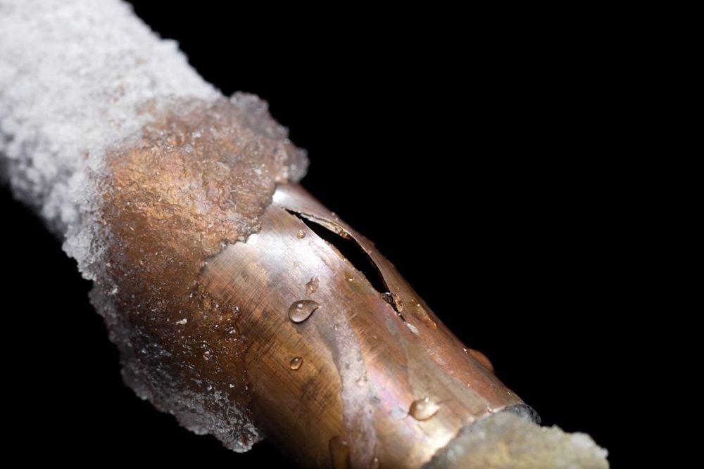 Frozen busted pipe. Consider how to keep your home’s pipes safe when preparing for the polar vortex.