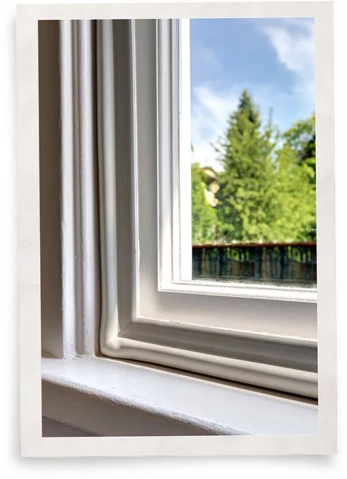 closeup of Indow window insert used for energy efficiency in historic home