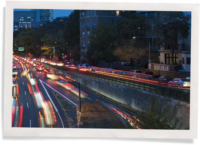 Heavy traffic outside of commercial buildings: soundproof commercial spaces for workers’ health.