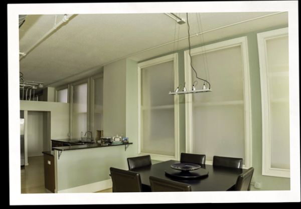 interior view of condo with Indow inserts, a window privacy coveringinter
