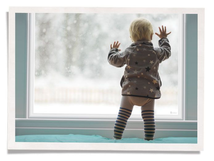 Small Child Looking Through Window & Touching Indow Window Insert