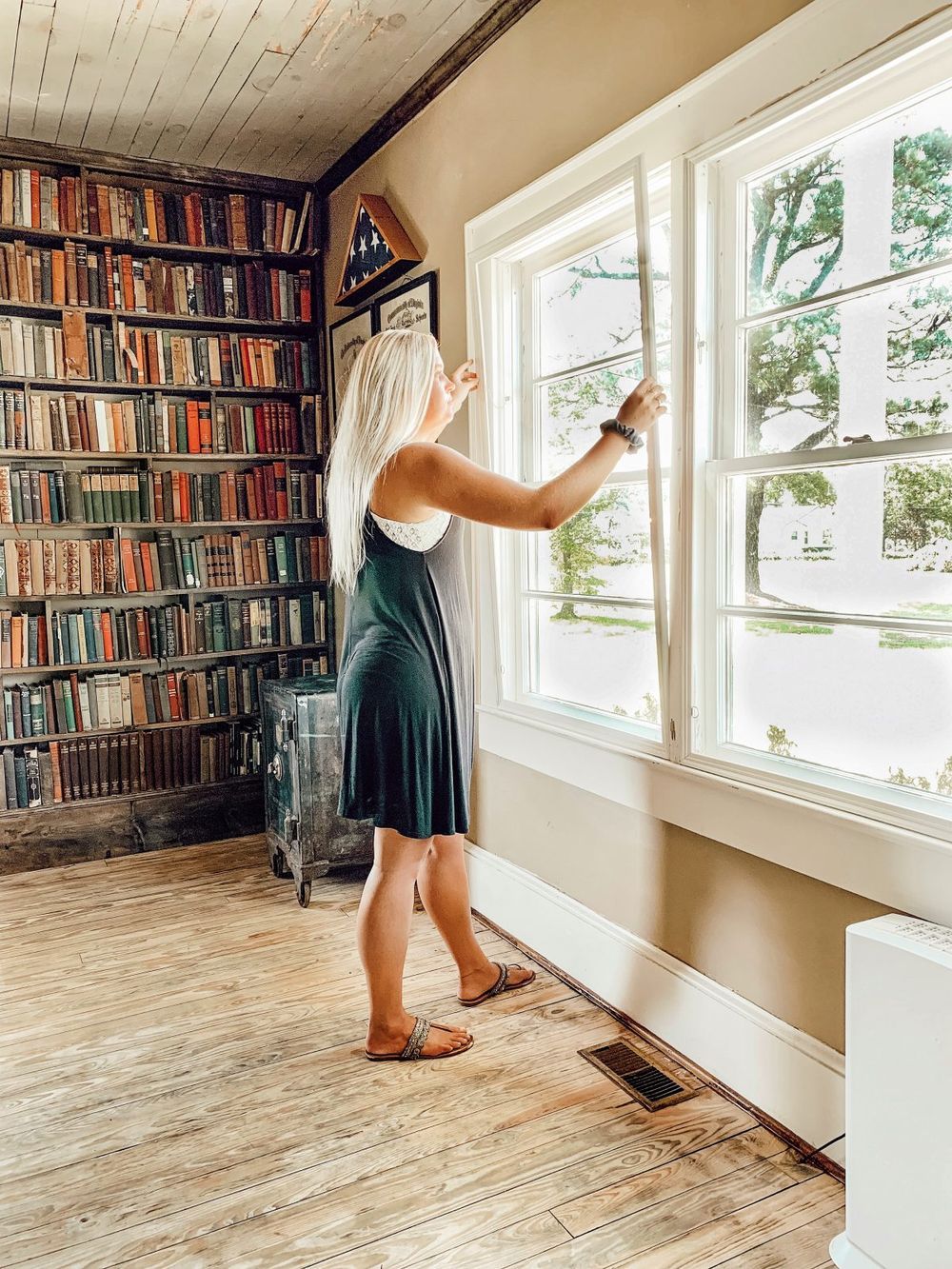 woman placing window insert